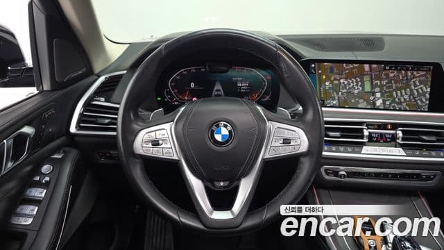 BMW X7 2022 — ფოტო 13/20