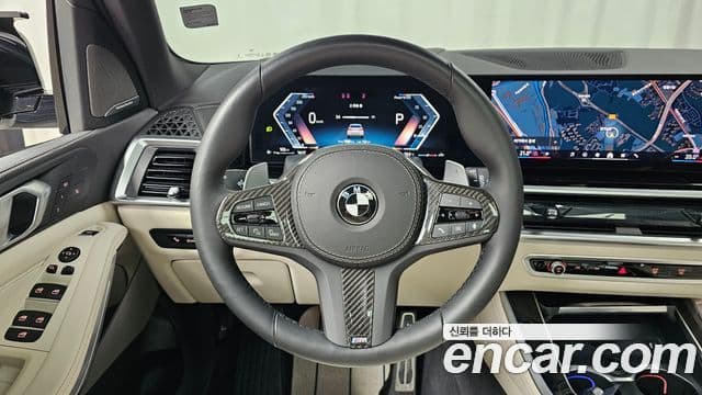 BMW X5 2025 — ფოტო 13/20
