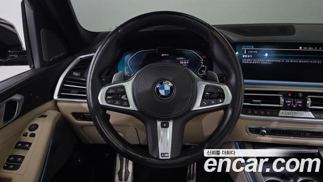 BMW X5 2021 — ფოტო 14/20