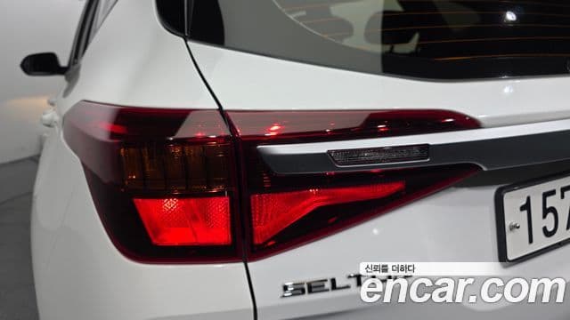 Kia Seltos 2021 — Şəkil 23/30