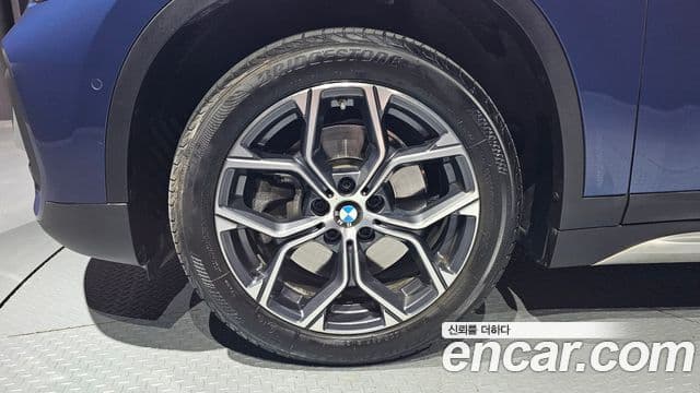 BMW X1 2021 — ფოტო 4/20