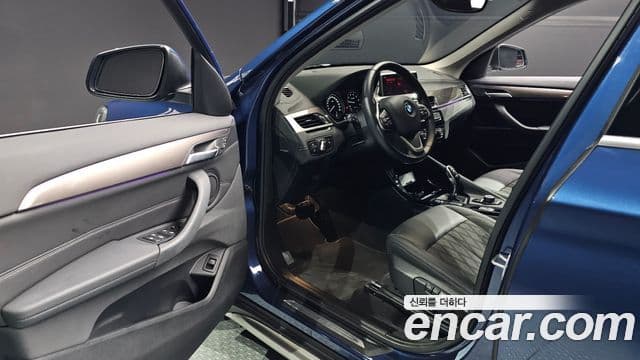 BMW X1 2021 — ფოტო 8/20