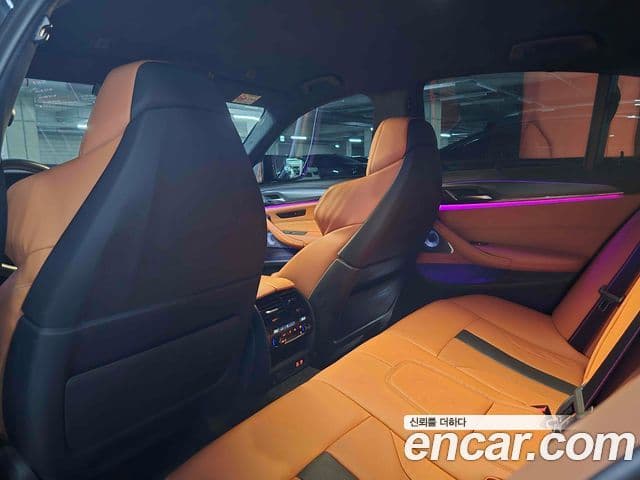BMW M5 2023 — ფოტო 7/15
