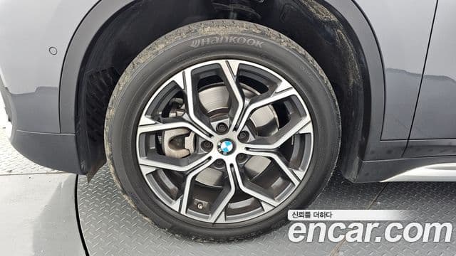 BMW X1 2022 — ფოტო 5/20