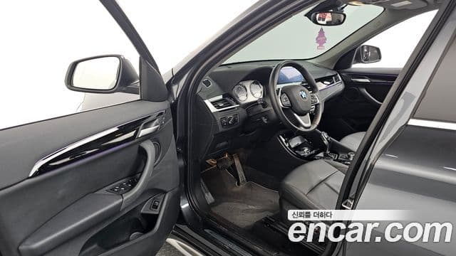 BMW X1 2022 — ფოტო 10/20