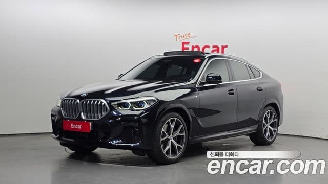 BMW X6 2022 — Фото 1/20