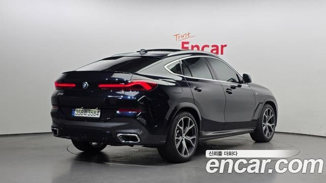 BMW X6 2022 — Фото 2/20
