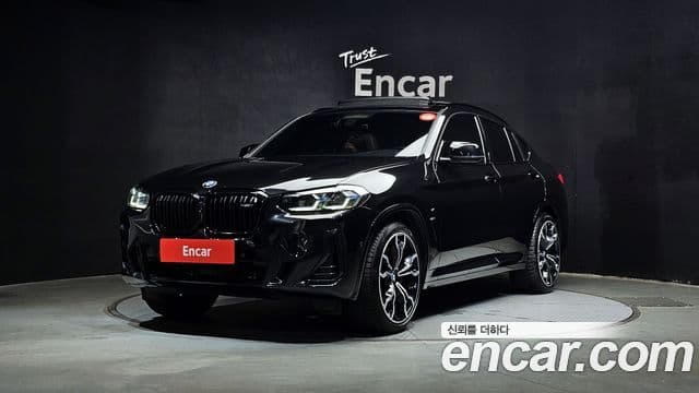 BMW X4 2023 — ფოტო 1/20