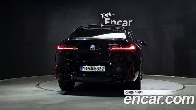 BMW X4 2023 — ფოტო 4/20