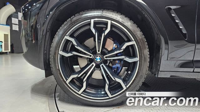 BMW X4 2023 — ფოტო 5/20