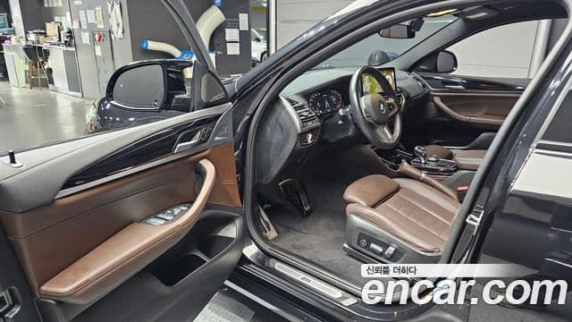 BMW X4 2023 — ფოტო 10/20