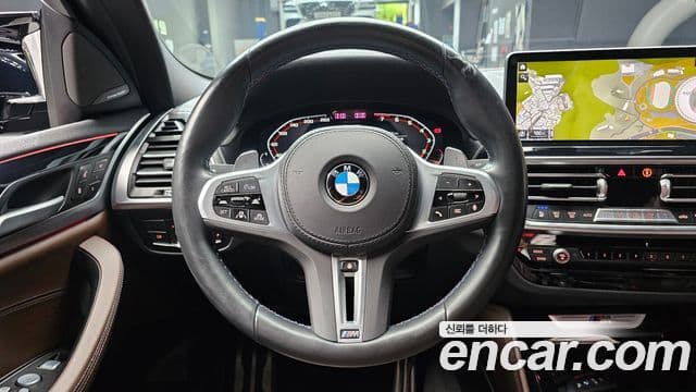 BMW X4 2023 — ფოტო 13/20