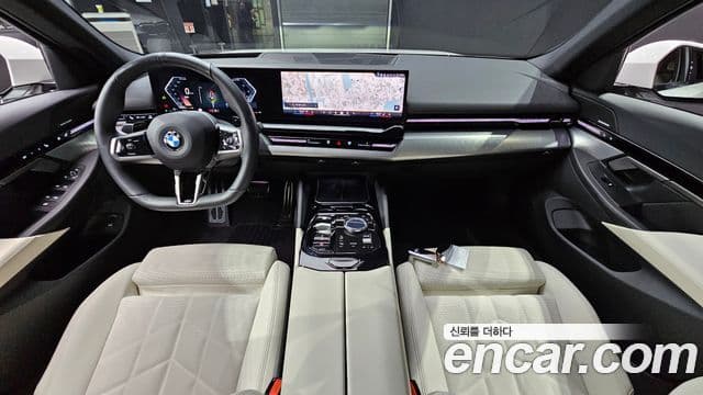 BMW 5 Series 2024 — ფოტო 7/20