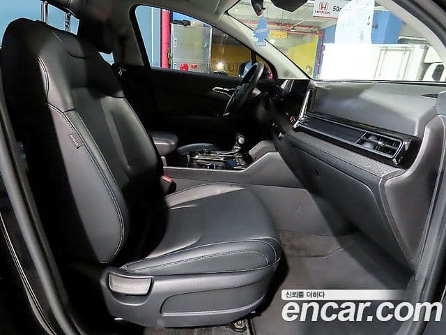 Kia Sportage 2021 — ფოტო 7/20