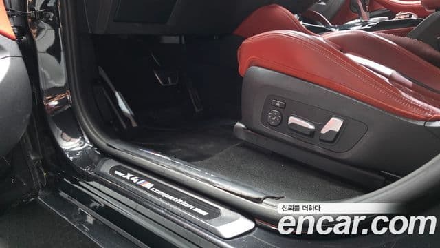 BMW X4M 2022 — ფოტო 14/34