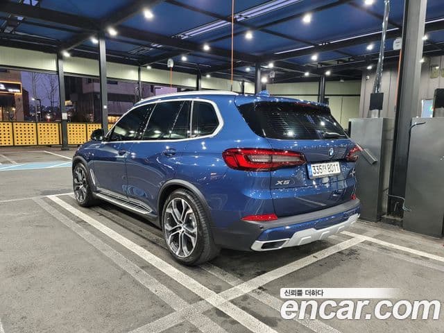 BMW X5 2021 — ფოტო 1/18