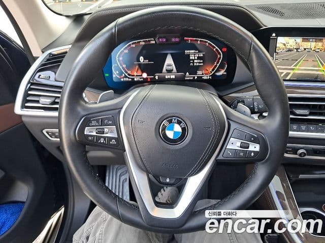 BMW X5 2021 — ფოტო 14/18