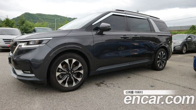 Kia Carnival 2021 — ფოტო 1/20