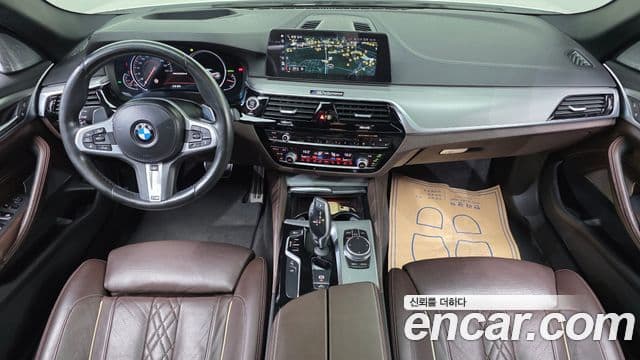 BMW 5 Series 2018 — Фото 7/20