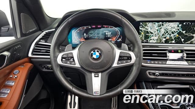 BMW X7 2022 — ფოტო 13/20