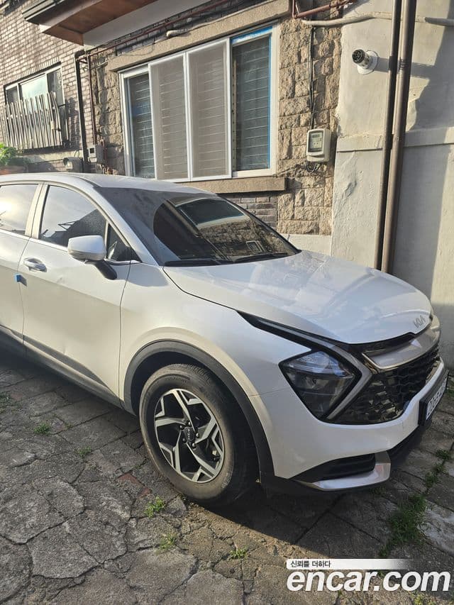 Kia Sportage 2022 — ფოტო 1/10