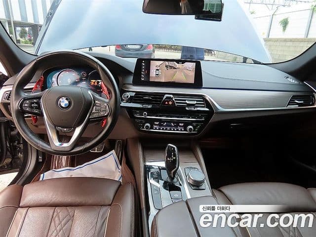 BMW 5 Series 2018 — Фото 10/20