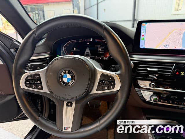 BMW 5 Series 2023 — ფოტო 10/16