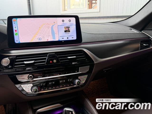 BMW 5 Series 2023 — ფოტო 15/16