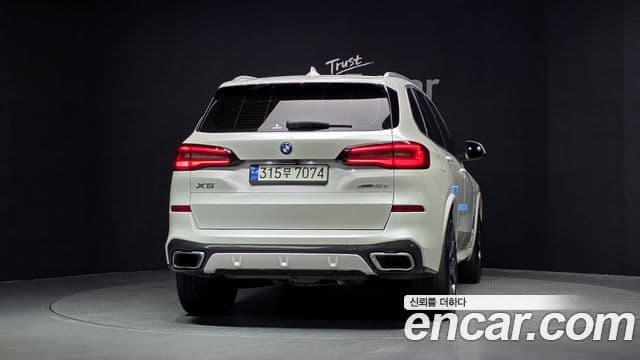 BMW X5 2022 — ფოტო 4/20