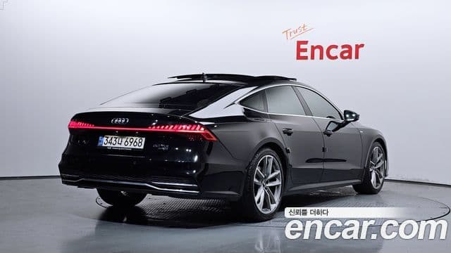 Audi A7 2021 — ფოტო 2/20