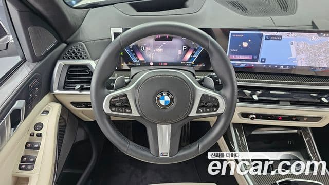 BMW X7 2025 — ფოტო 13/20