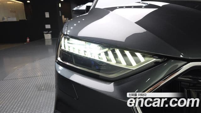 Audi A7 2022 — ფოტო 1/32