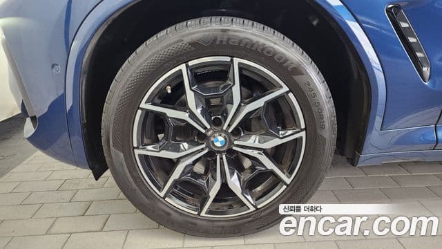 BMW X4 2022 — ფოტო 5/20