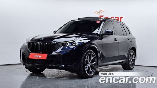 BMW X5 2024 — Фото 1/20