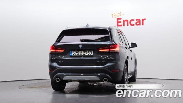 BMW X1 2021 — ფოტო 4/20