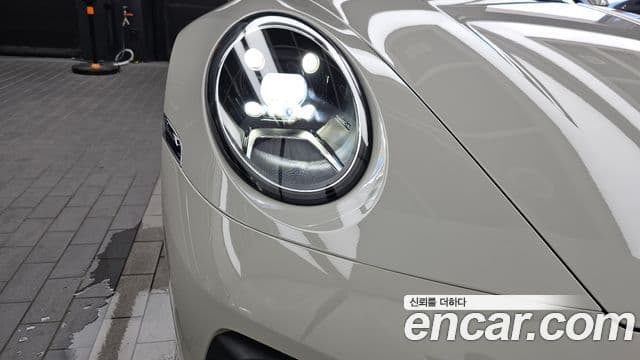 Porsche 911 2023 — ფოტო 30/35