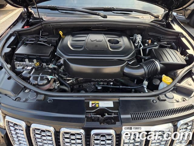 Jeep Grand Cherokee 2021 — Фото 18/20