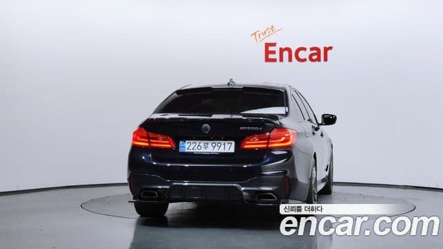 BMW 5 Series 2018 — Фото 4/20