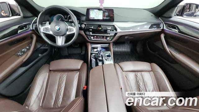 BMW 5 Series 2018 — Фото 7/20