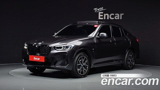 BMW X4 2022 — Фото 1/20