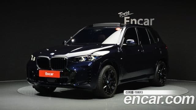 BMW X5 2025 — Фото 1/20