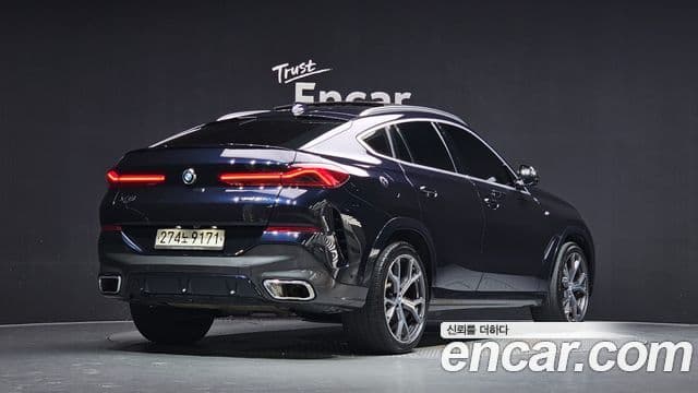 BMW X6 2020 — Фото 2/20