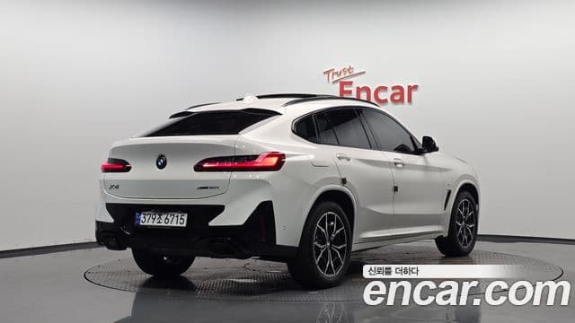 BMW X4 2023 — Фото 2/20