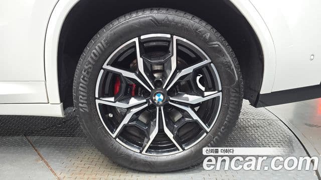 BMW X4 2023 — Photo 26/32