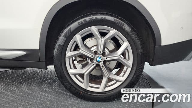 BMW X3 2022 — Photo 25/32