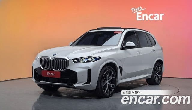 BMW X5 2023 — Фото 1/20