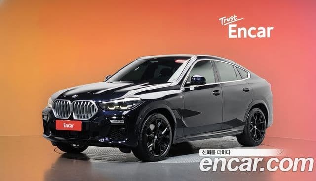 BMW X6 2020 — Фото 1/20