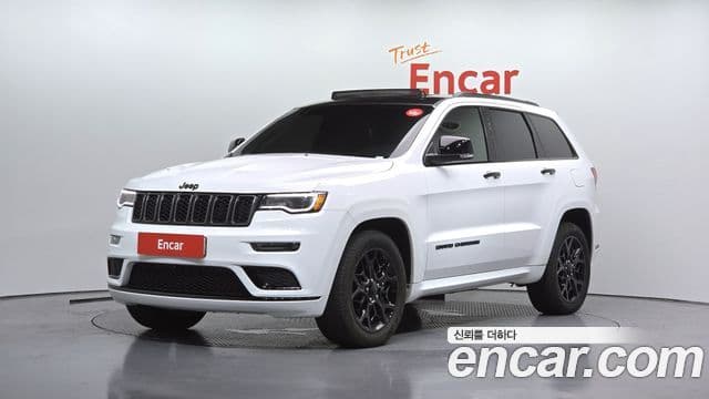 Jeep Grand Cherokee 2021 — Фото 1/20
