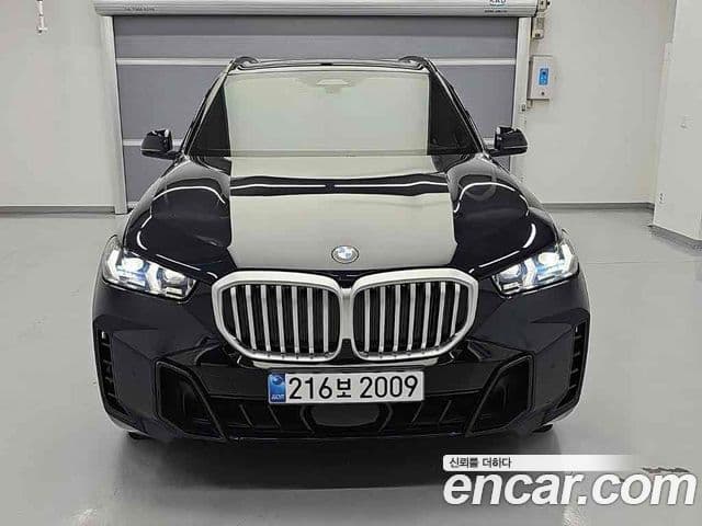 BMW X5 2024 — ფოტო 8/18