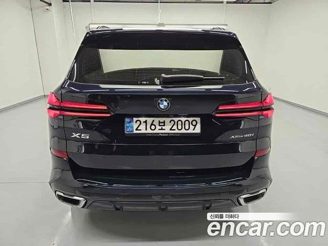 BMW X5 2024 — ფოტო 15/18
